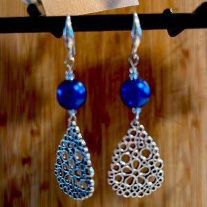 Hand crafted silver tone, tear drop earrings w/ blue pearl.